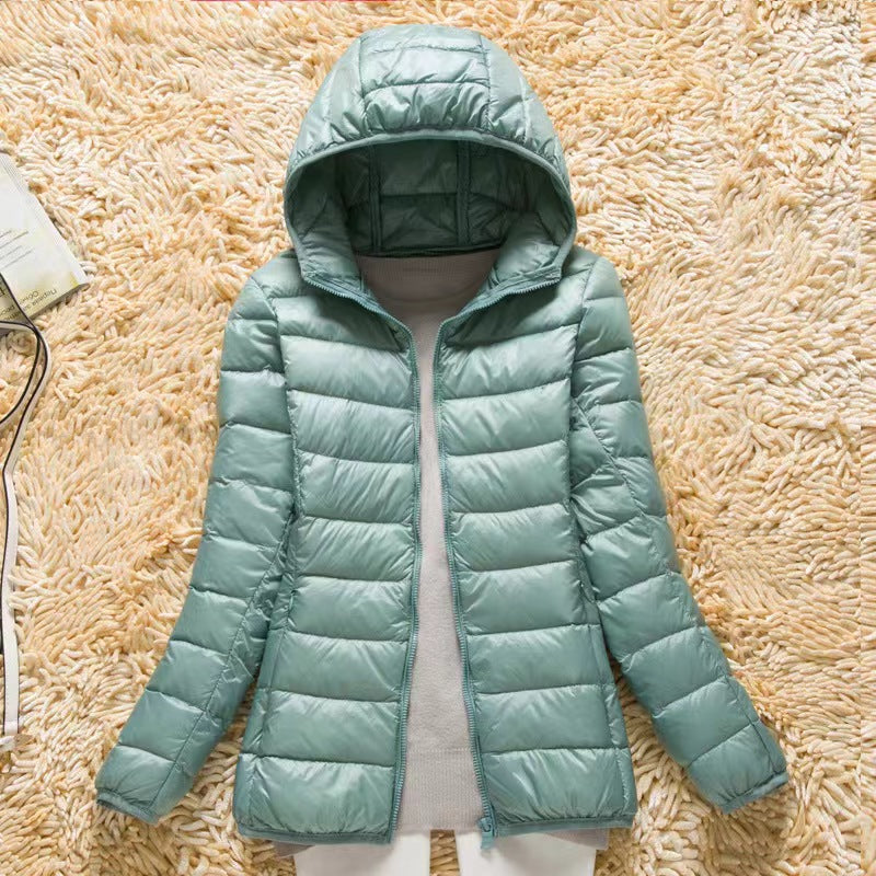 Doudoune ultra-légère et compacte avec capuche pour femme