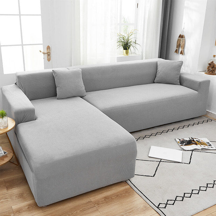 Housse de canapé extensible texturée et antidérapante