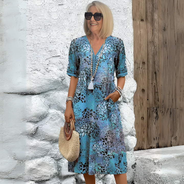Robe mi-longue à col en V souple pour femme