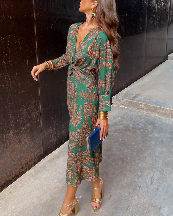 Robe midi imprimée avec nœud sur le devant et décolleté en V profond