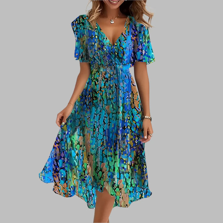 Robe mi-longue élégante à fleurs et fronces pour femme