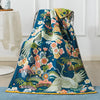 Serviette de bain à motif de grues et de fleurs luxuriantes