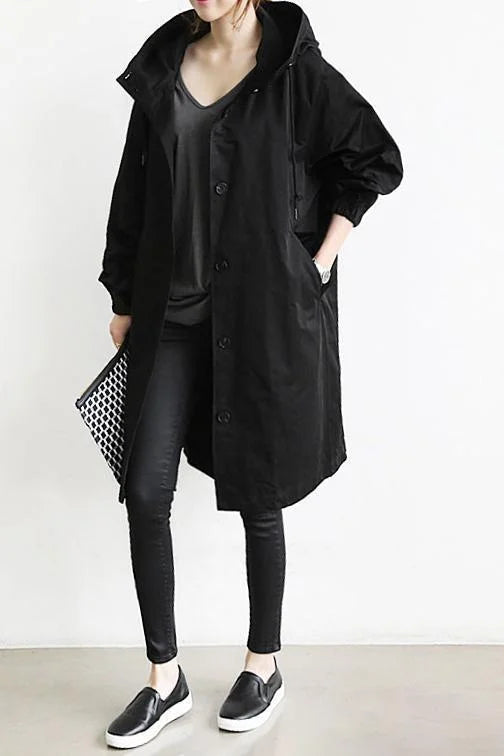 Trench-coat imperméable oversize pour femme : Élégance et protection pour la mi-saison