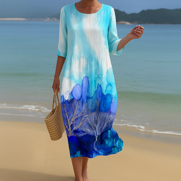 Robe mi-longue fluide et légère pour femme