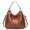 Sac à bandoulière classique en cuir avec détails dorés élégants