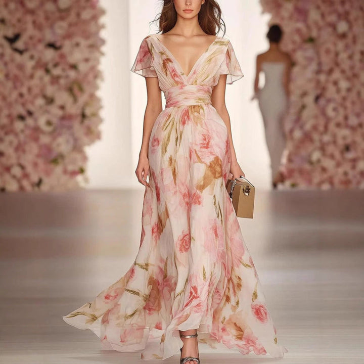 Robe longue ajustée et évasée à manches flottantes