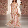 Robe longue ajustée et évasée à manches flottantes