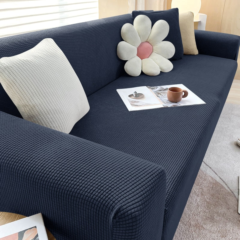 Housse de canapé extensible texturée et antidérapante