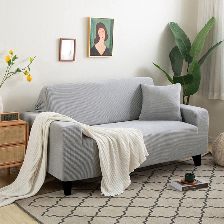 Housse de canapé extensible texturée et antidérapante