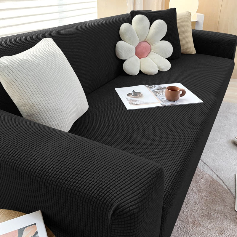Housse de canapé extensible texturée et antidérapante