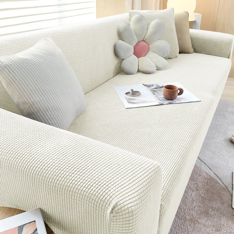 Housse de canapé extensible texturée et antidérapante