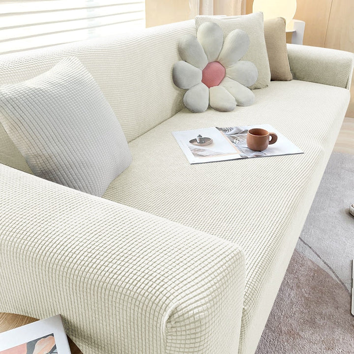 Housse de canapé extensible texturée et antidérapante