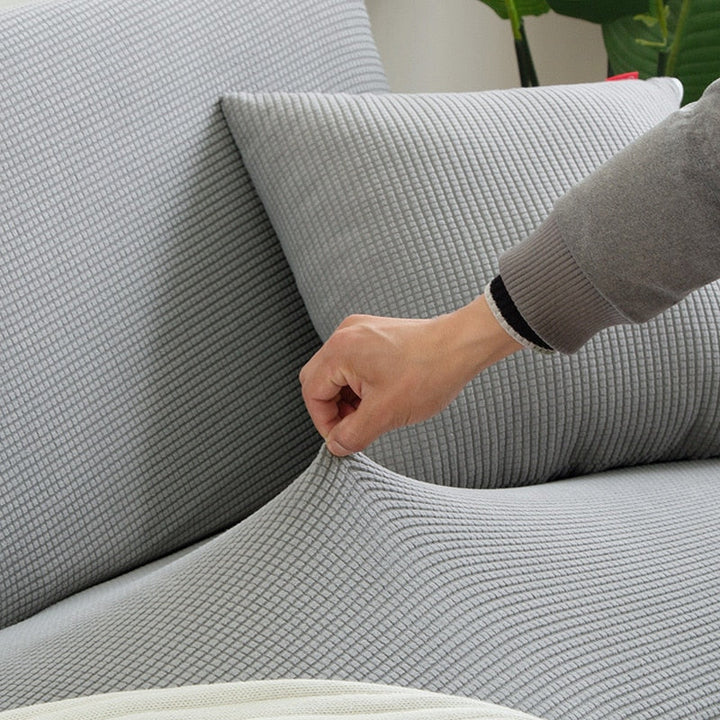 Housse de canapé extensible texturée et antidérapante