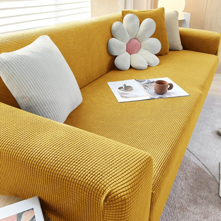 Housse de canapé extensible texturée et antidérapante
