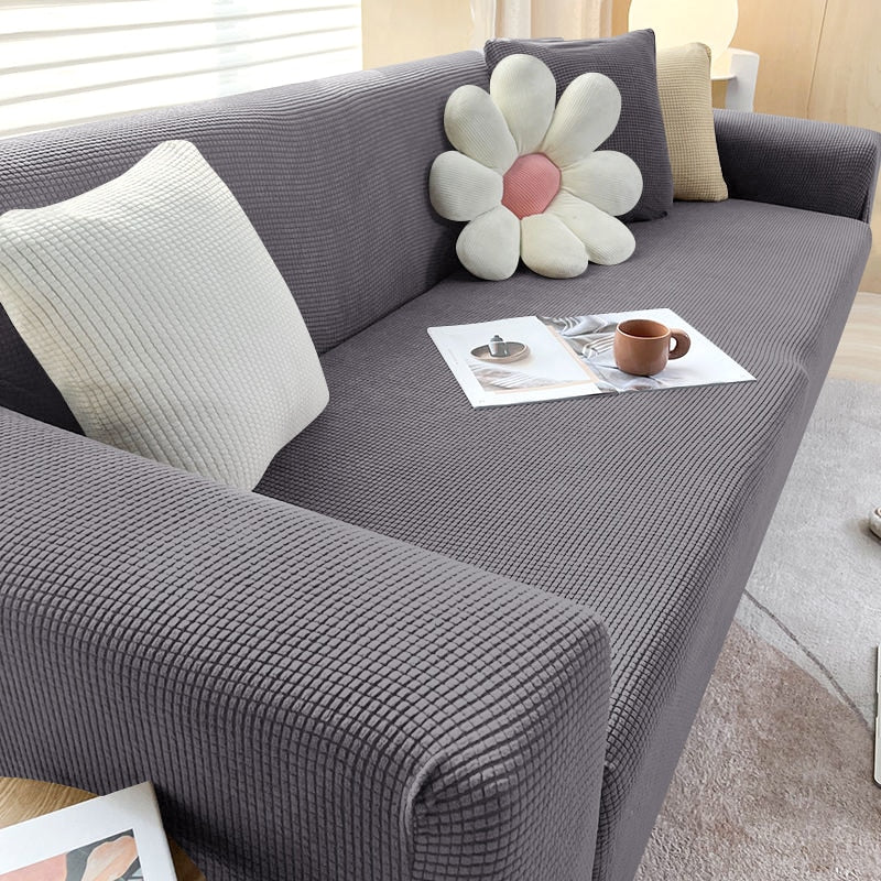 Housse de canapé extensible texturée et antidérapante