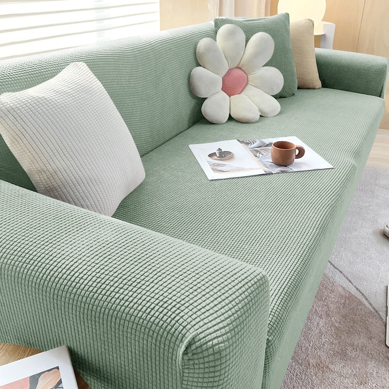 Housse de canapé extensible texturée et antidérapante