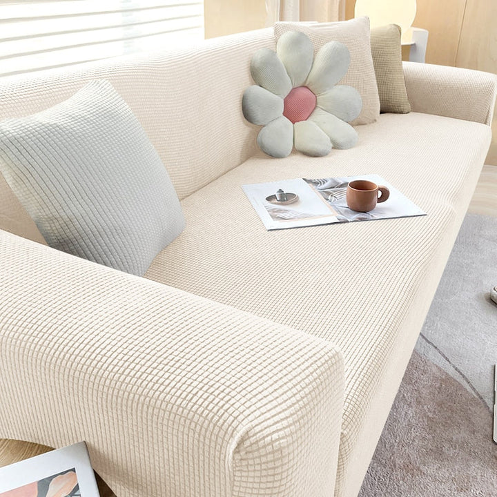 Housse de canapé extensible texturée et antidérapante