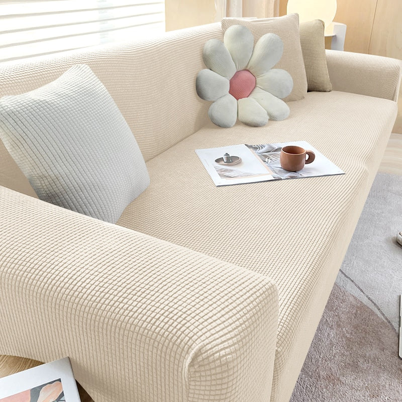 Housse de canapé extensible texturée et antidérapante
