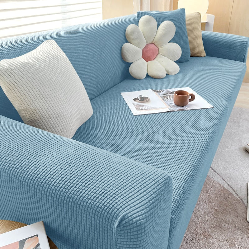 Housse de canapé extensible texturée et antidérapante