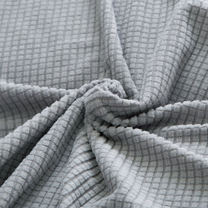 Housse de canapé extensible texturée et antidérapante