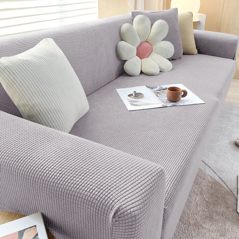 Housse de canapé extensible texturée et antidérapante