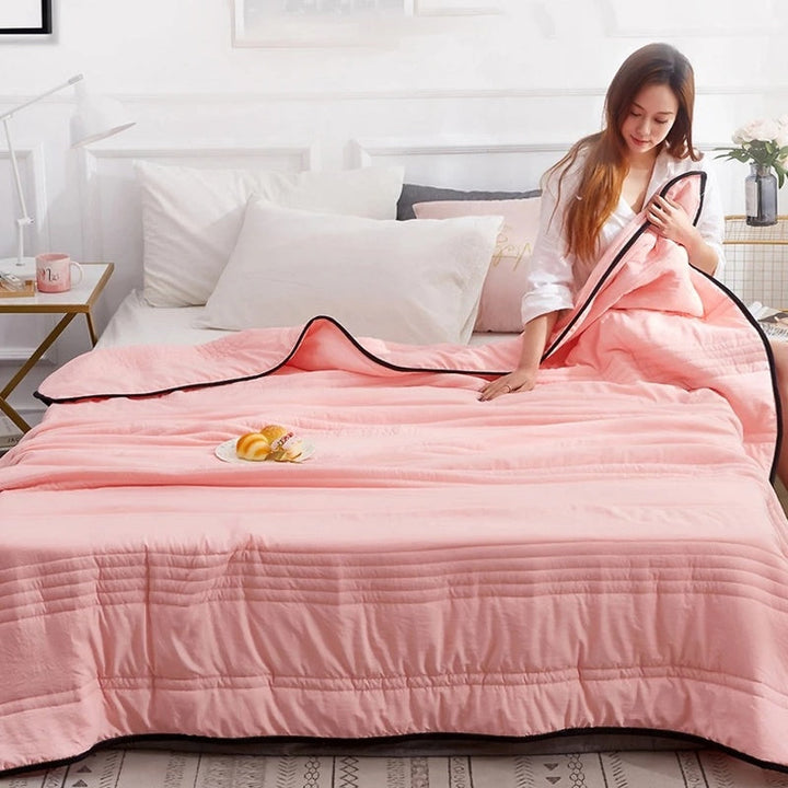 Couverture Rafraîchissante pour un Sommeil Réparateur
