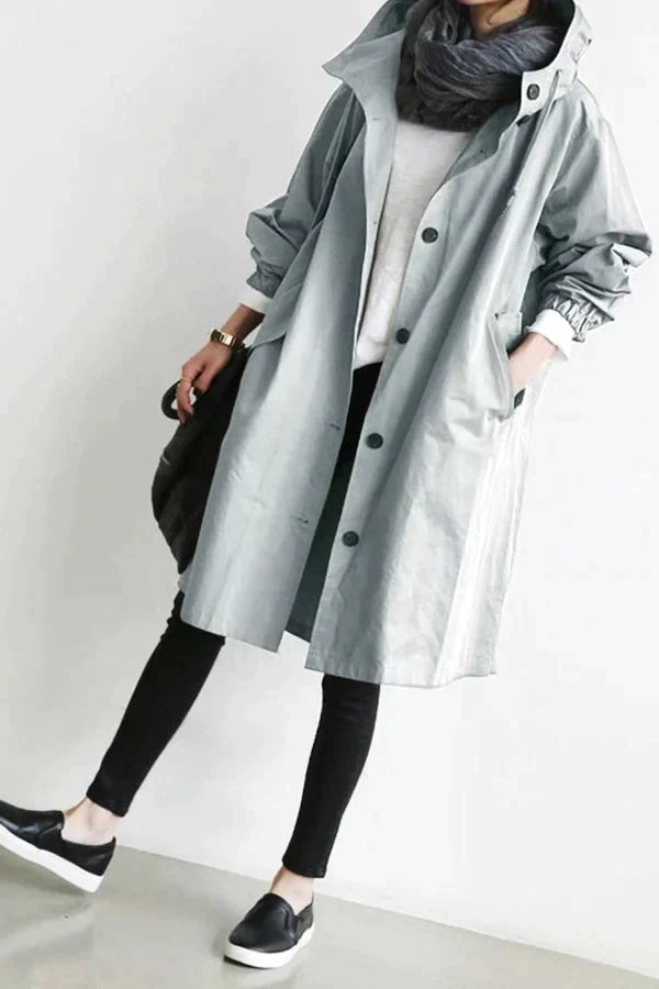 Trench-coat imperméable oversize pour femme : Élégance et protection pour la mi-saison