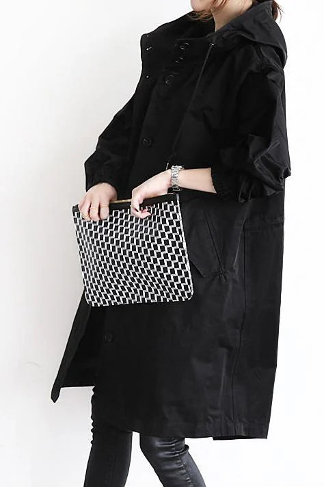 Trench-coat imperméable oversize pour femme : Élégance et protection pour la mi-saison