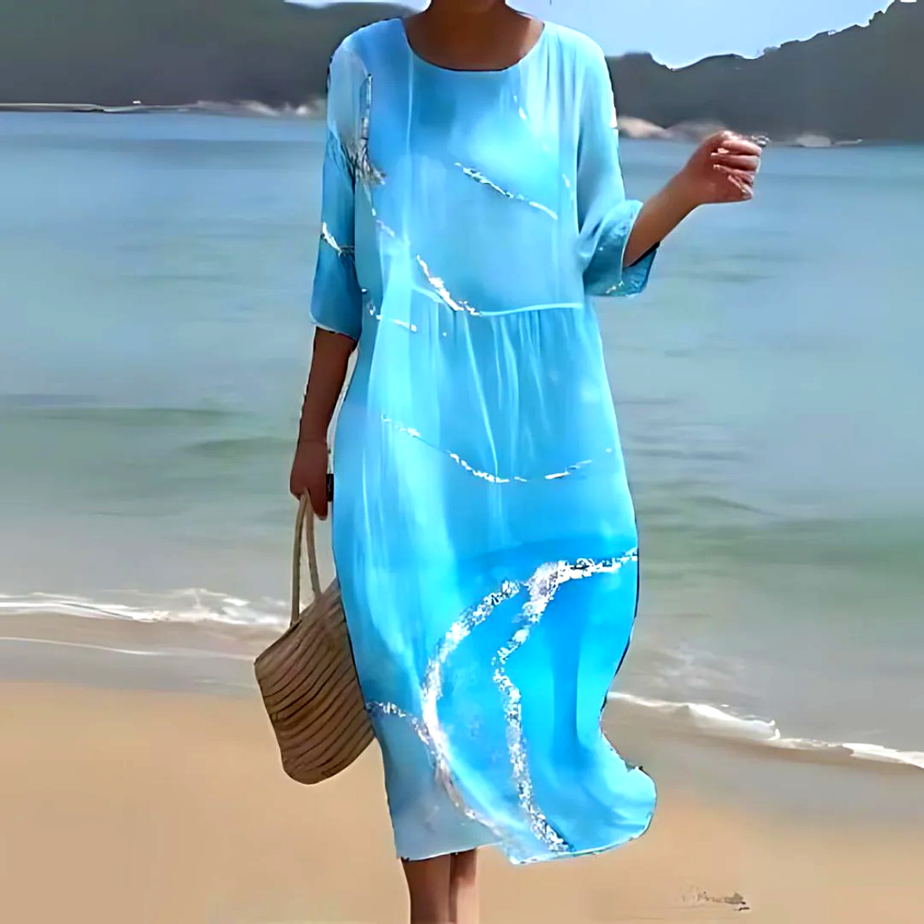 Robe mi-longue fluide et légère pour femme