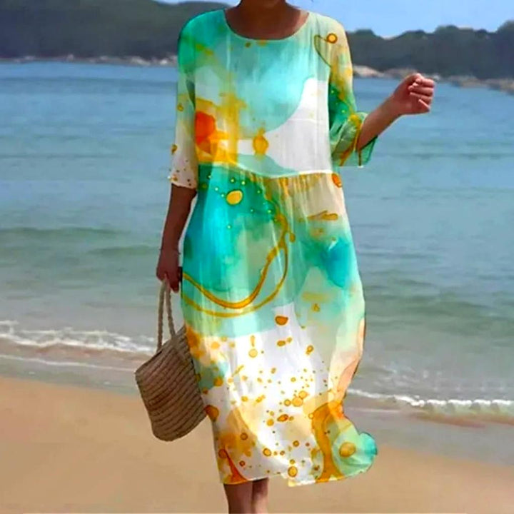 Robe mi-longue fluide et légère pour femme