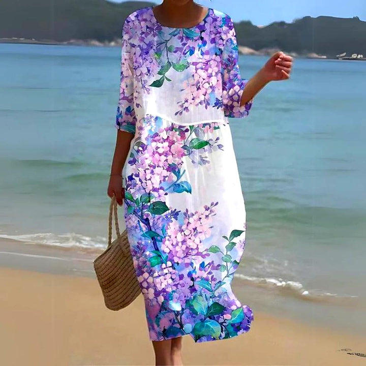 Robe mi-longue fluide et légère pour femme