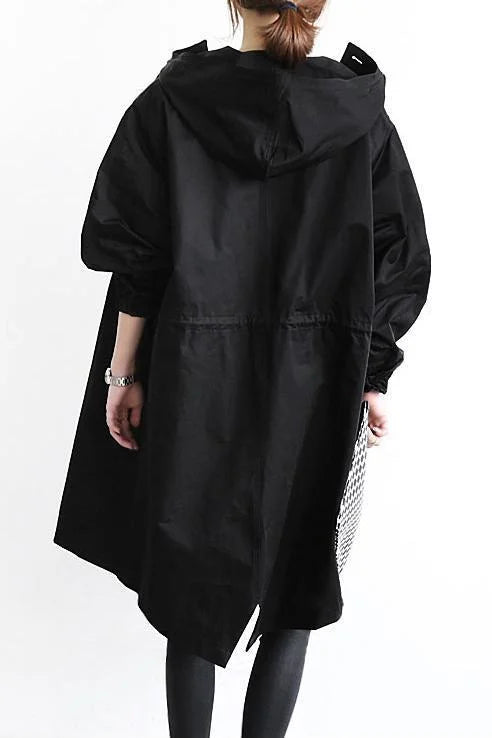 Trench-coat imperméable oversize pour femme : Élégance et protection pour la mi-saison