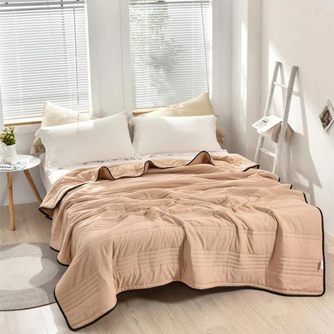 Couverture Rafraîchissante pour un Sommeil Réparateur